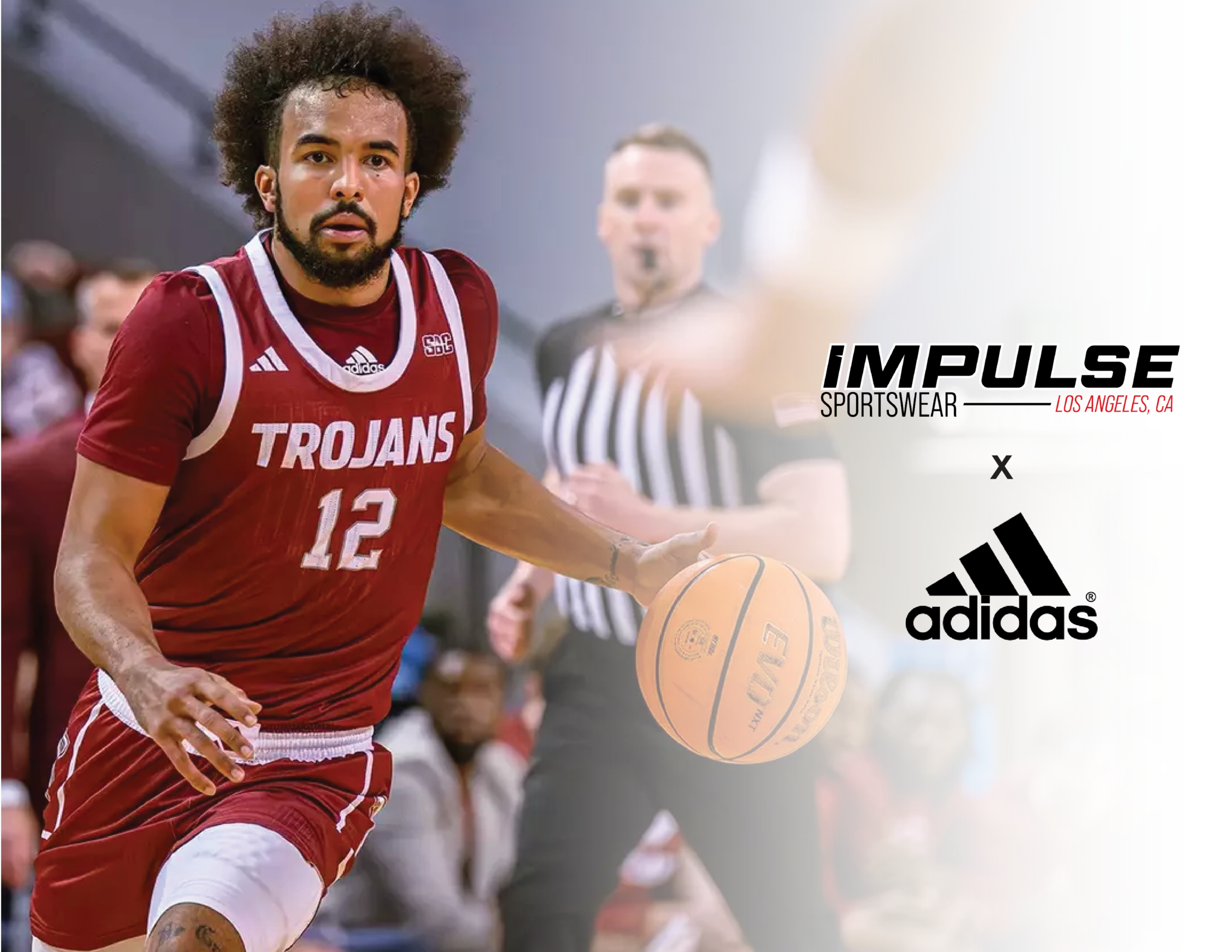 Man In an adidas basketball jersey dribbling a basketball